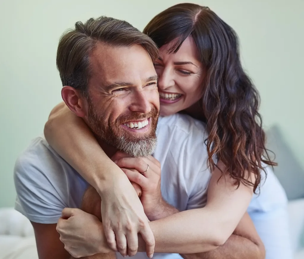 Happy couple in bed